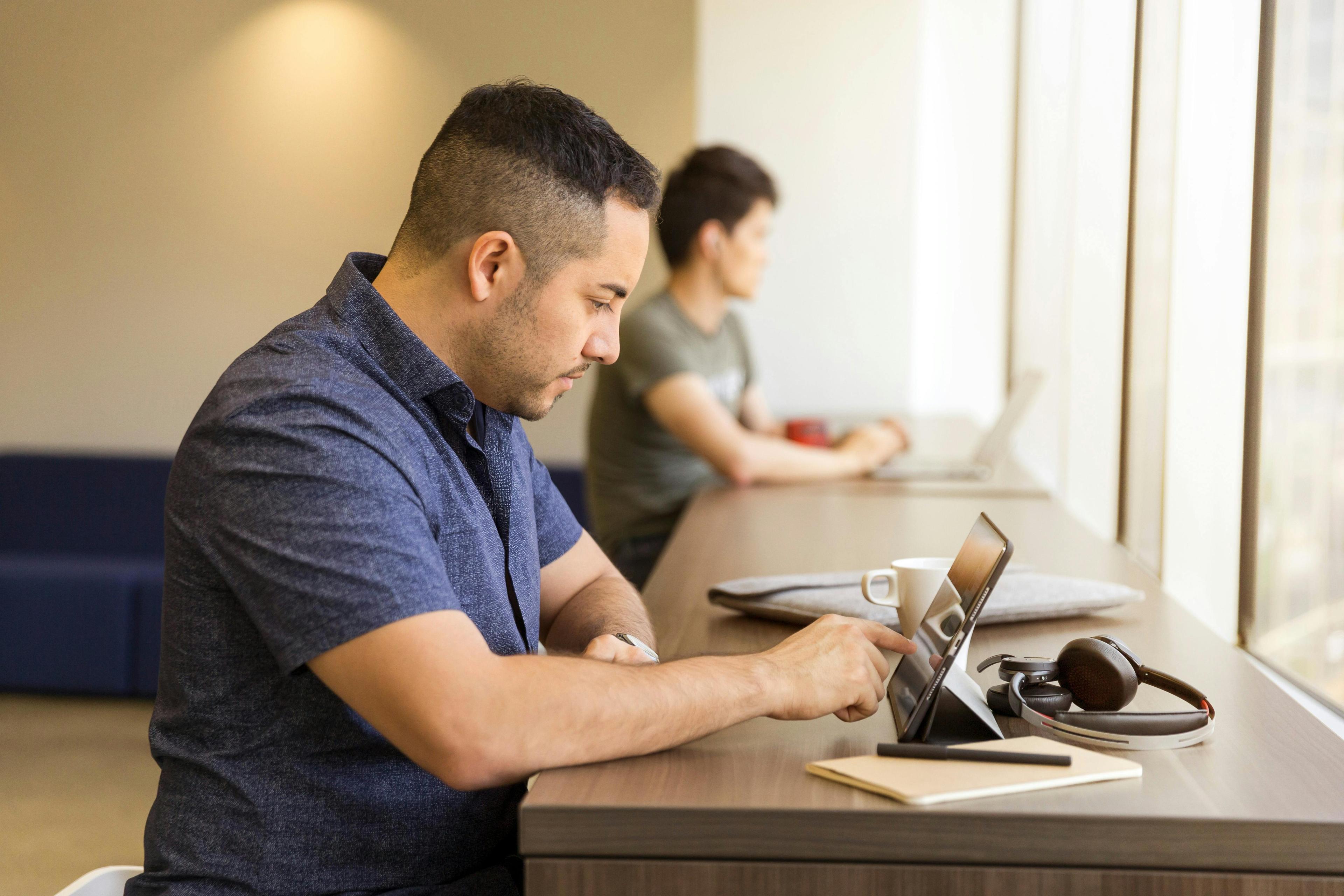 Professional working in a premium Hivo App space